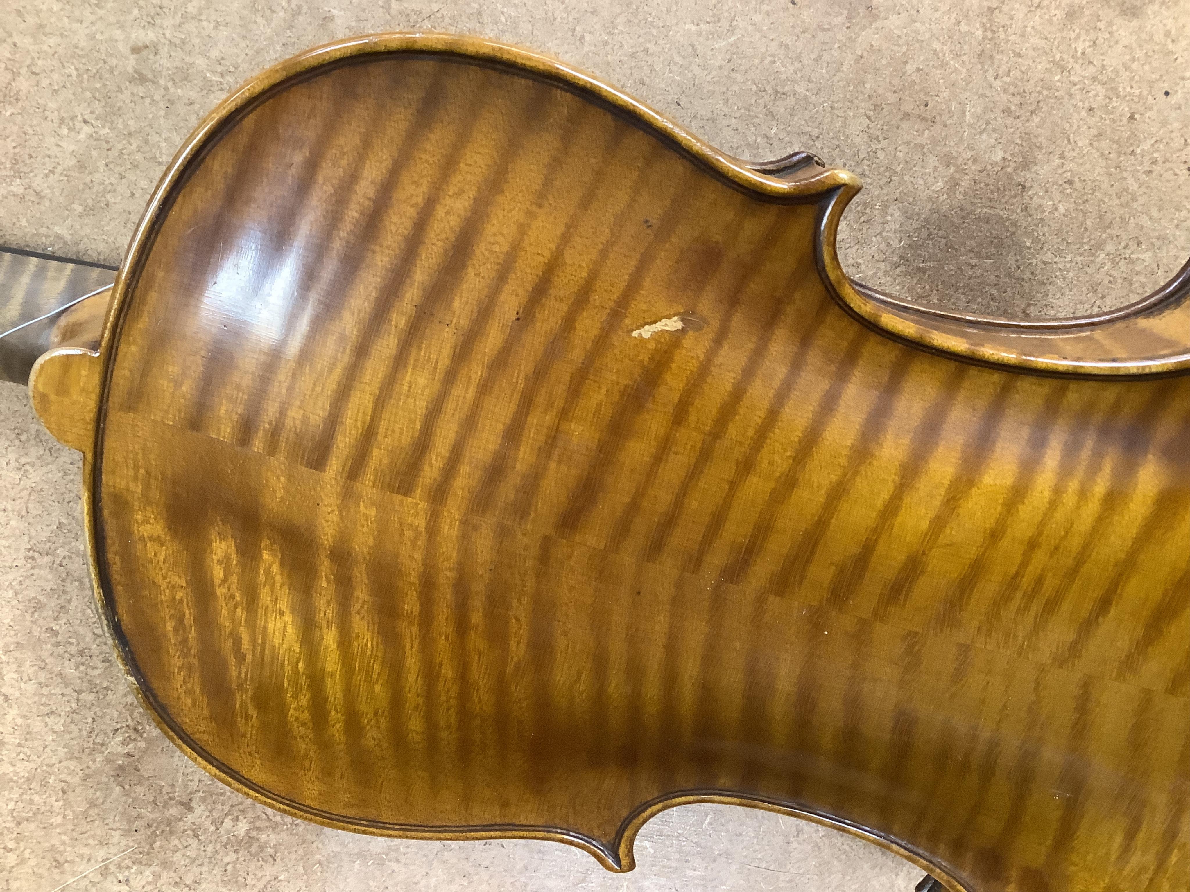 A late 19th century German violin in a Hill & Son oak case, with Hill canvas slip cover, together with an unbranded silver mounted bow, and another, ivory submission ref: 9HJU3B45 and ZC2E1GCP